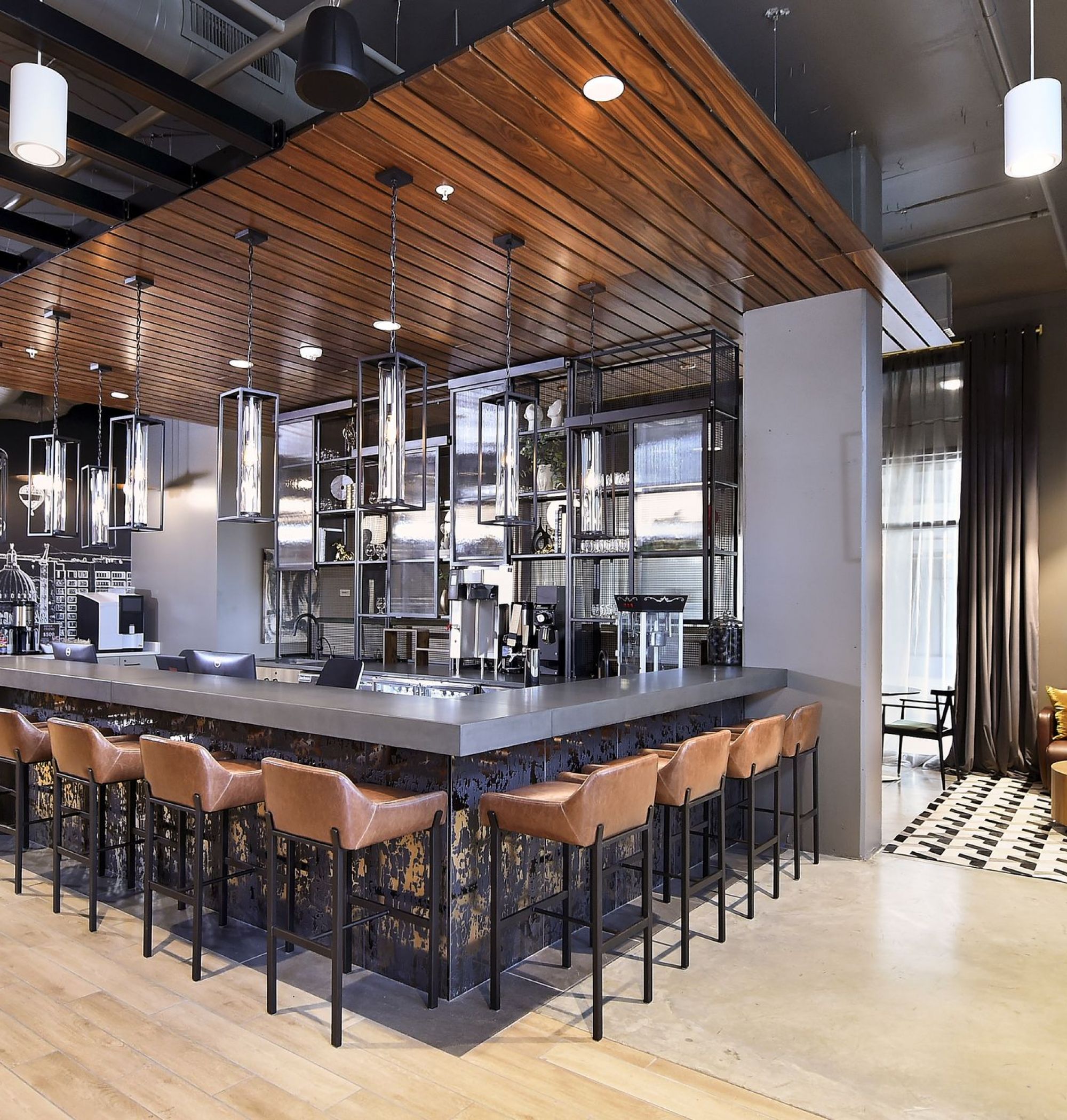 LOCAL Boise Apartments modern spacious lounge with full coffee bar, bar seating, and comfortable seating